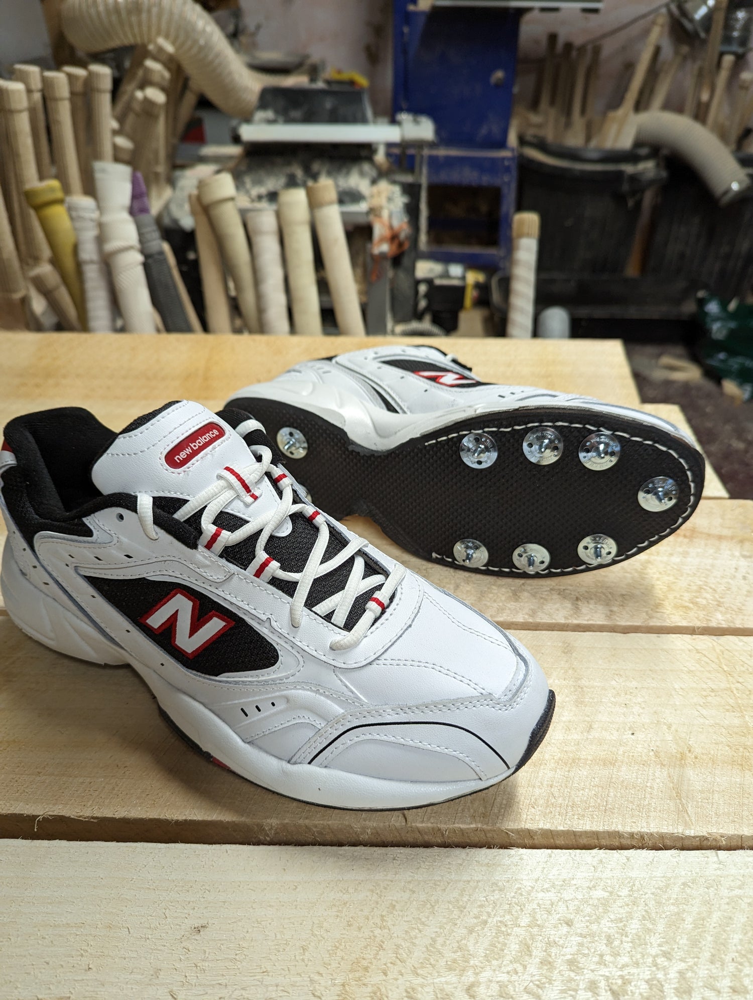 New balance spiked cross trainers